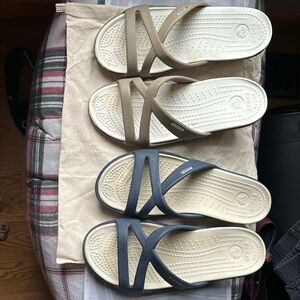 Crocs - 2 pairs of gently used crocs - navy and tan - Size 7